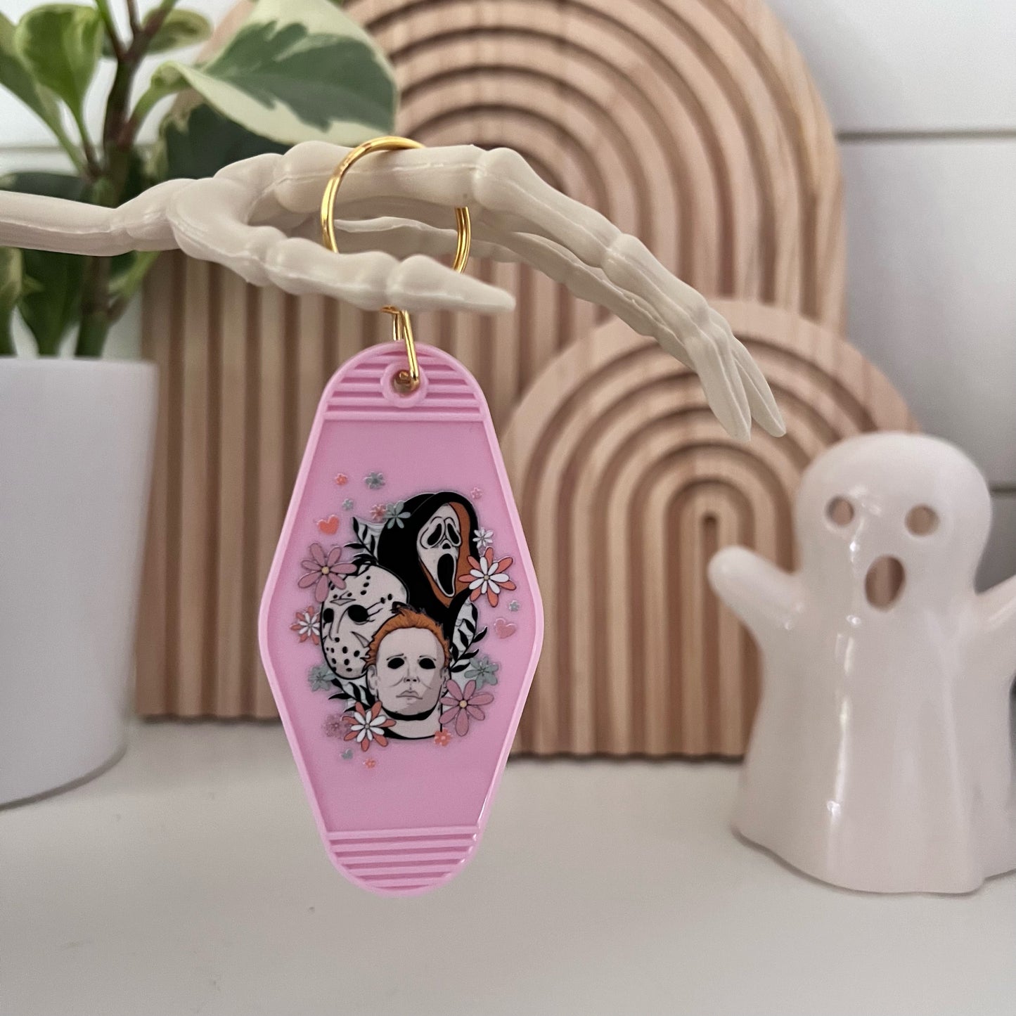 Motel Keychain with a Floral themed Halloween Serial Killers