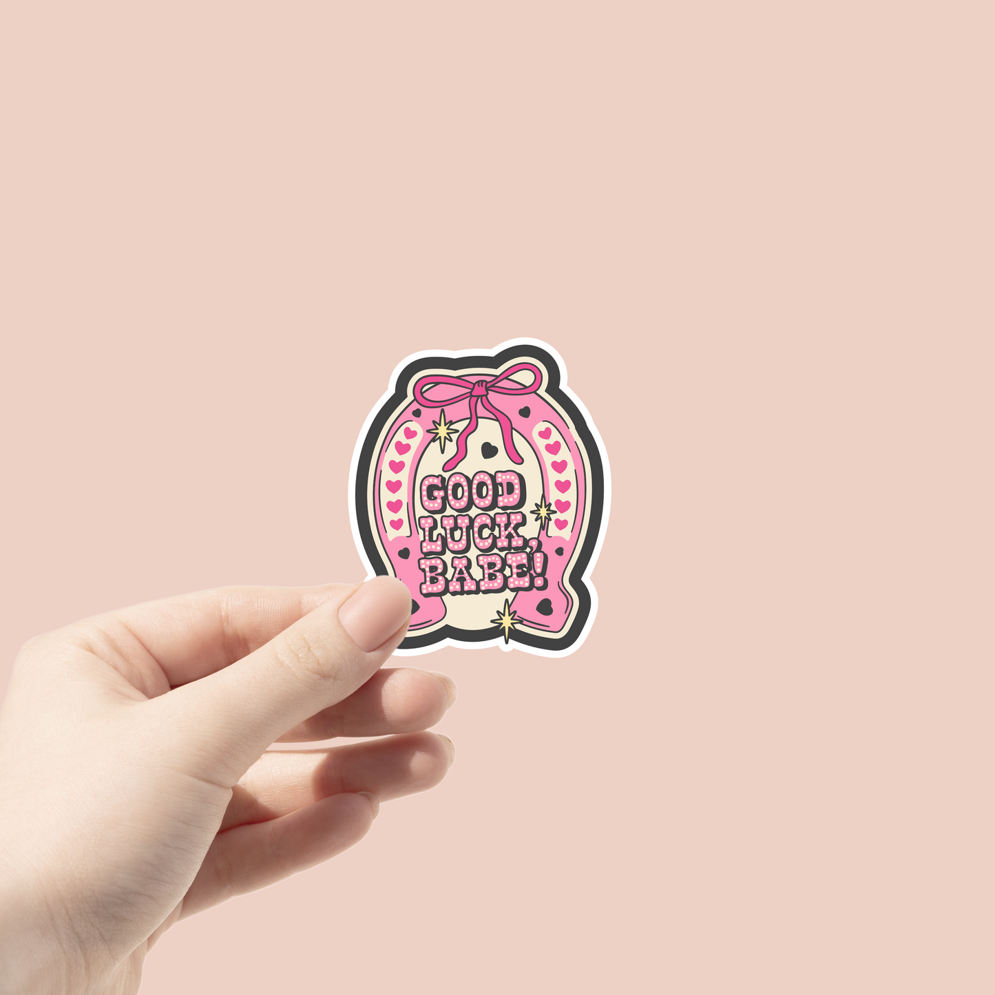 sticker inspired by the song good luck babe feature a horseshoe and pink bows