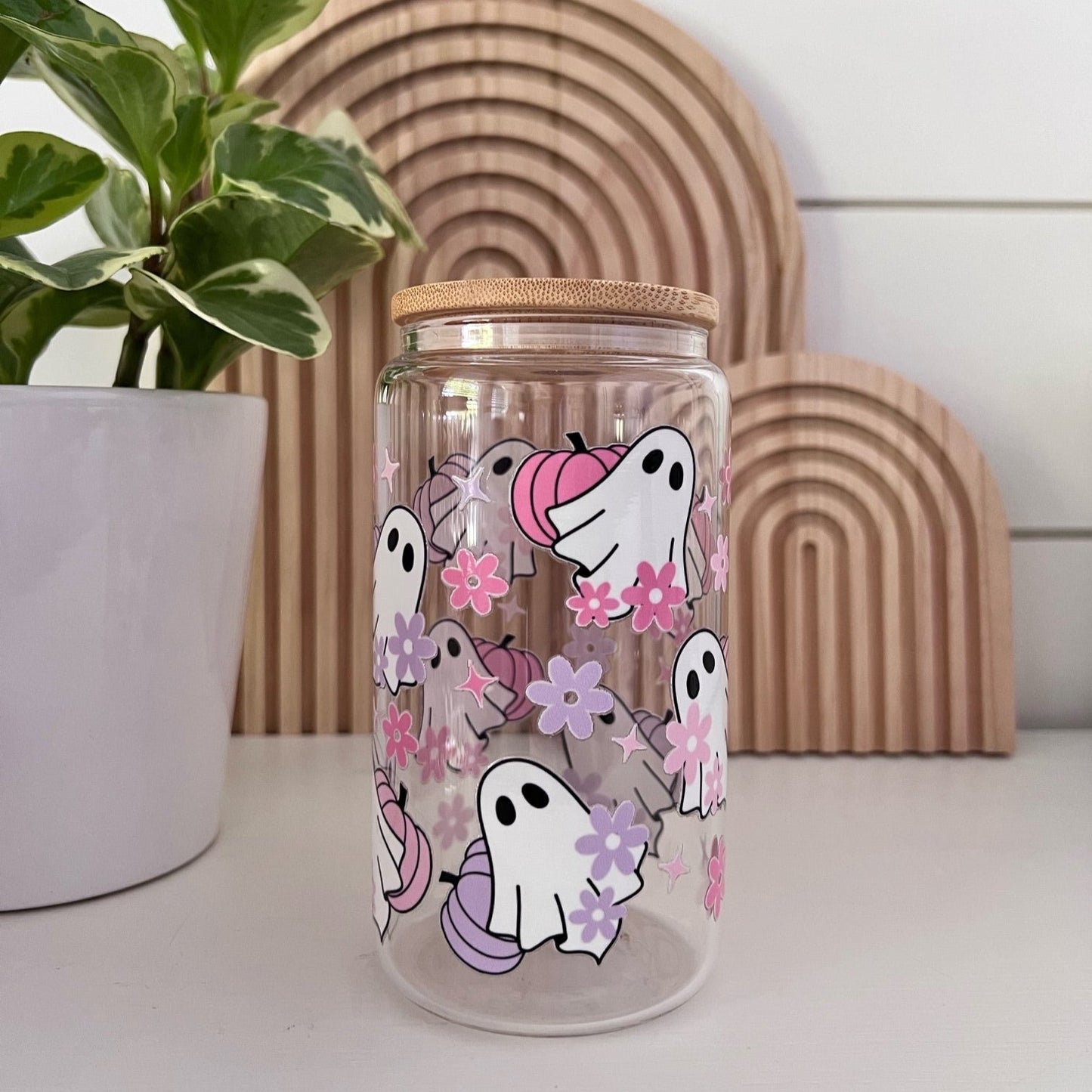 Glass Cup with ghosts and pastel pumpkin and daisy designs