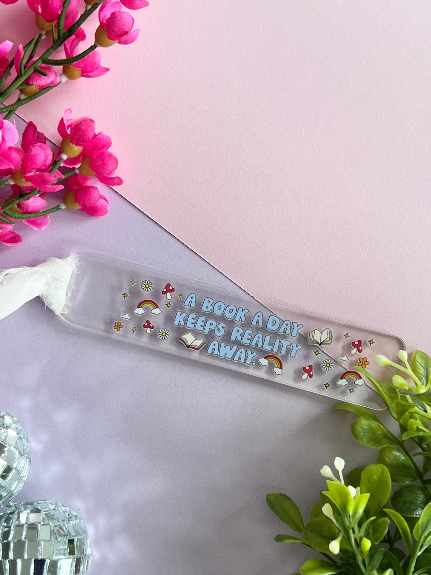 A book a day keeps reality away bookmark