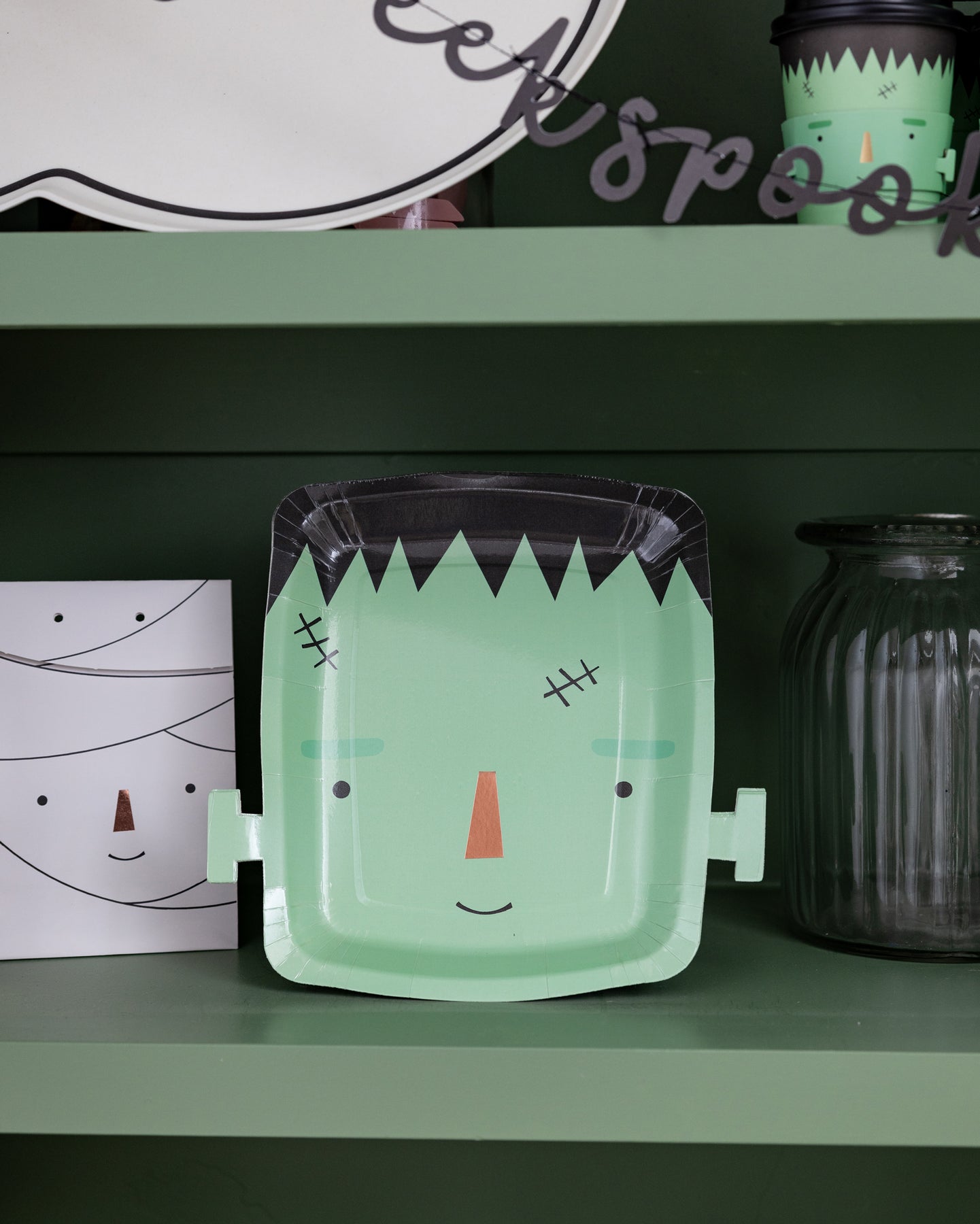 Frankenstein paper plate sitting on shelf