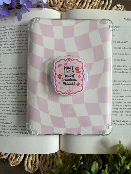 Likely to have Grandma Hobbies E-Reader/ Phone Grip