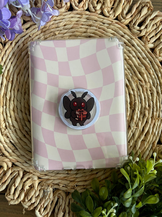 mothman holding a stack of books e reader / phone grip