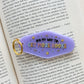 On my Way to Get More Books Motel Keychain