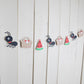 picnic ants themed paper garland strung on the wall