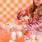 pink and orange checkered paper cup