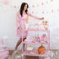 bar cart featuring out pink hocus pocus party supplies