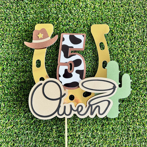 rodeo themed cake topper with name and age and gold foil horseshoe