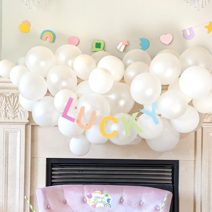 lucky charms banner -glitter paper scissors