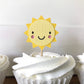 closeup of sunshine cupcake topper that have pink cheeks